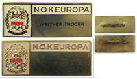 2x Teilnehmer-Abzeichen des N.O.K. Europa 1973 "C.N.O.E. Monaco 1973". Ein Abzeichen mit original Namensschildchen des Trgers "W. Trger". Bronze, versilbert, teilweise mehrfarbig emailliert. 5.8x2.5 cm.<br>-- Schtzpreis: 125,00  --