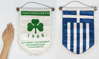 Spielwimpel von Panathinaikos Athen "UEFA Champions League Real Madrid v Panathinaikos FC. 4th of December 2001" Grn bedruckter Seidenwimpel mit weien Fransen, grn-weier Schnur und Holzstange mit Holzkugeln. Rckseite mit der griechischen Flagge. 38x29