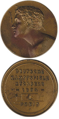 Siegermedaille der Stadt Nrnberg fr die Deutschen Kampfspiele 1934 mit der Gravur "II. Preis", Bronze, 4,2 cm.